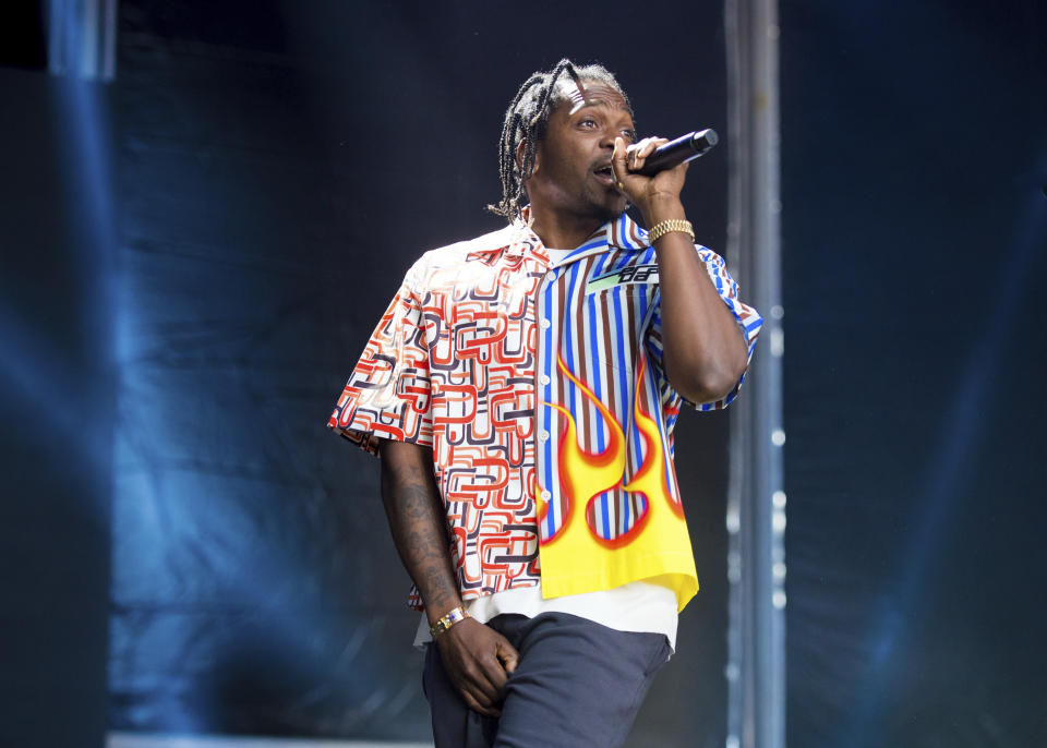 FILE - In this June 2, 2018 file photo, rapper Pusha T performs at The Governors Ball Music Festival in New York. In a year where rap easily dominated as music’s top genre, Pusha T’s 21-minute, seven-track “Daytona” album moved the needle and became one of the most successful hip-hop projects of the year, he won his rap beef with Drake and he earned a Grammy nomination for best rap album. (Photo by Scott Roth/Invision/AP, File)