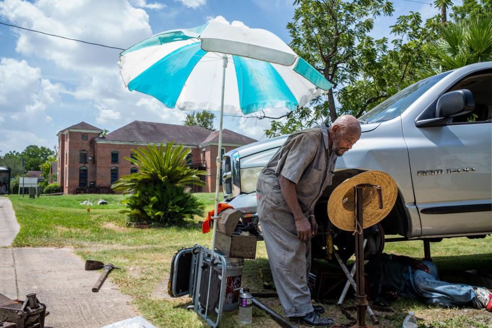 Heat waves, like the heat dome over the South in July 2022, can hit outdoor workers especially hard. <a href="https://www.gettyimages.com/detail/news-photo/community-mechanic-lloyd-bush-works-on-a-neighbors-vehicle-news-photo/1410189284" rel="nofollow noopener" target="_blank" data-ylk="slk:Brandon Bell/Getty Images;elm:context_link;itc:0;sec:content-canvas" class="link ">Brandon Bell/Getty Images</a>