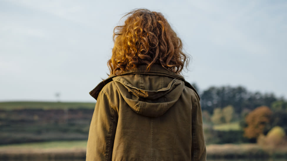 Anonymous young person in the countryside