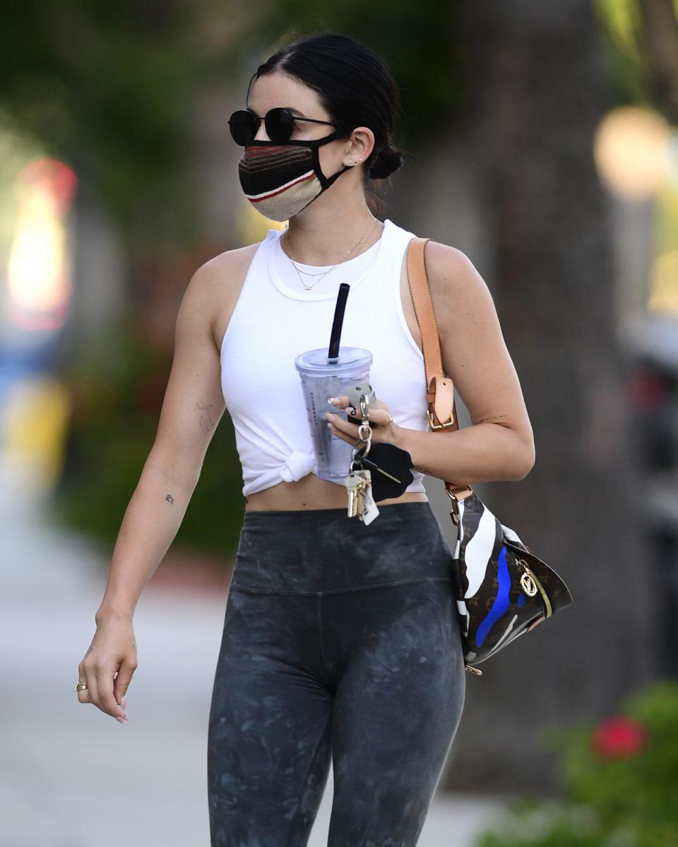 <p>Lucy Hale makes her way to a Los Angeles gym on Monday.</p>