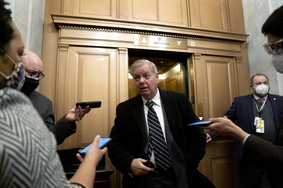 Sen. Lindsey Graham, R-S.C., speaks to reporters on the fifth day of the second impeachment trial of former President Donald Trump, Saturday, Feb. 13, 2021 at the Capitol in Washington. (Stefani Reynolds/Pool via AP)