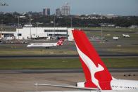 Qantas planes are seen at Kingsford Smith International Airport in Sydney