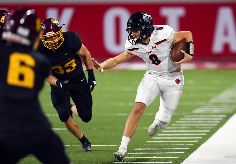 Brandon Valley's Lucas Slack runs the ball, trying to keep himself in-bounds in the class 11AAA football championship on Saturday, November 13, 2021, at the DakotaDome in Vermillion.