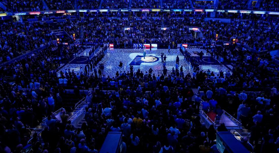 Indiana Pacers and Memphis Grizzlies fans stand for the National Anthem before the start of the game Saturday, Jan. 14, 2023 at Gainbridge Fieldhouse in Indianapolis. 