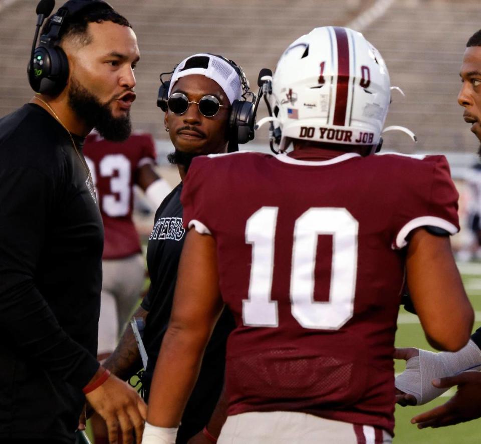 North Side head coach Joseph Turner talks to the team during a time out in the first half of a UIL football game at Farrington Field in Fort Worth, Texas, Friday, Oct. 06, 2023. Wyatt led North Side 13-7 at the half. (Special to the Star-Telegram Bob Booth)