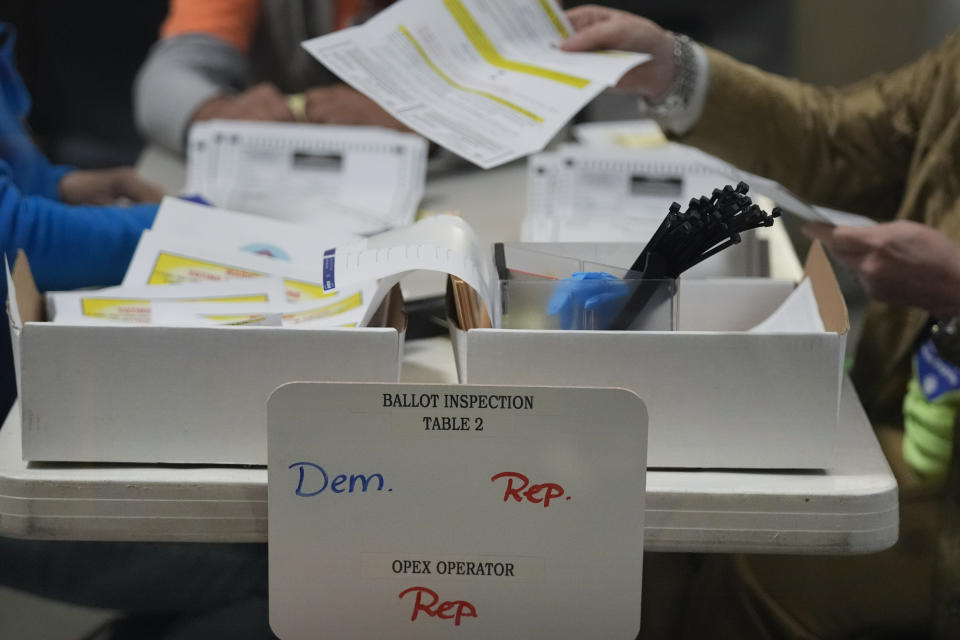 Election workers process ballots at the Clark County Election Department, Thursday, Nov. 10, 2022, in Las Vegas. (AP Photo/Gregory Bull)