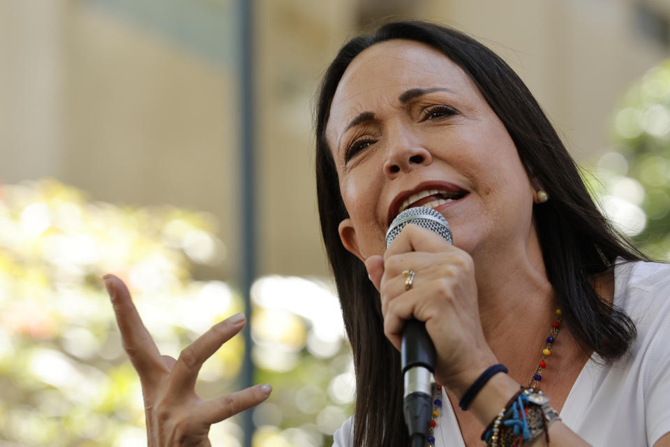 FILE - Opposition coalition presidential hopeful Maria Corina Machado speaks to supporters at a campaign event in Caracas, Venezuela, Tuesday, Jan. 23, 2024. Condemnation against the government of Venezuela for its decision to block the presidential candidacy of opposition leader María Corina Machado continues to strengthen. On Sunday, Jan. 28, the Organization of American States declared that the move eliminates any possibility of a free election this year. (AP Photo/Jesus Vargas, File)