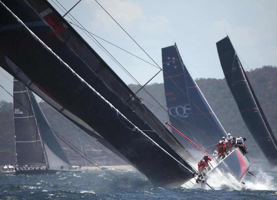 The yacht Scallywag races toward the heads during the start of the Sydney Hobart yacht race in Sydney, Australia, Monday, Dec. 26, 2016. The 88 yachts started in the annual 628-nautical mile race to Australia's island state of Tasmania. (AP Photo/Rick Rycroft)