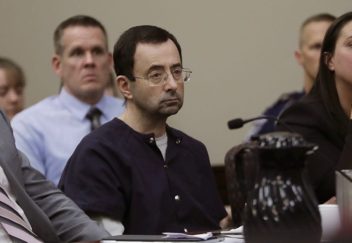 Larry Nassar sits during his sentencing hearing Wednesday, Jan. 24, 2018, in Lansing, Michigan. Nassar, who was convicted of sexually abusing female gymnasts including Olympic medalists, was stabbed multiple times during an altercation with another inmate at a federal prison in Florida on Sunday, July 9, 2023. (AP Photo by Carlos Osorio, File)