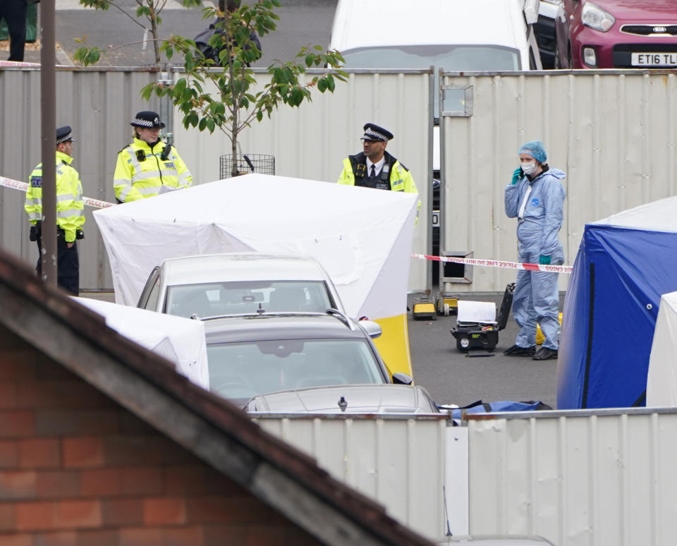 Police forensic tents outside the house in Bermondsey, south-east London, after three women and a man were stabbed to death in the early hours of Monday (SWNS)