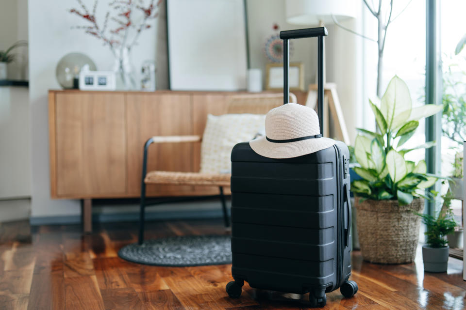 A suitcase inside a house