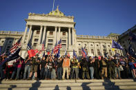 FILE - Supporters of President Donald Trump demonstrate outside the Pennsylvania state Capitol, Saturday, Nov. 7, 2020, in Harrisburg, Pa. (AP Photo/Julio Cortez, File)