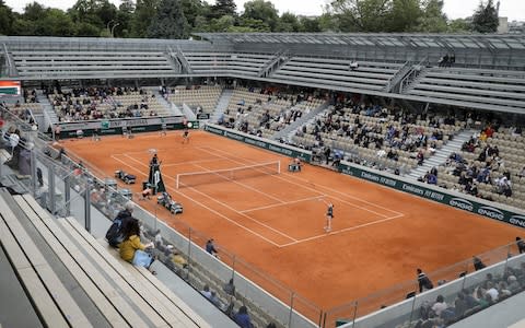 A disappointingly sparse crowd watches the match - Credit: afp