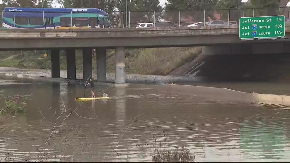 Paddleboarder on highway in San Diego County (KSWB) 