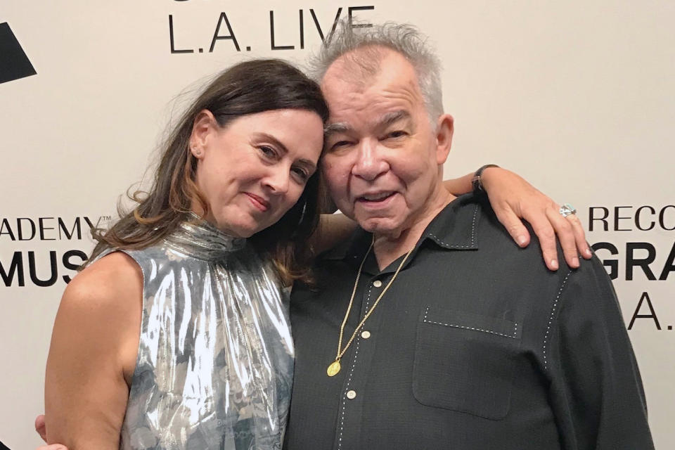 This 2018 photo provided by Fiona Prine shows Prine and her husband, John, in Los Angeles. Both battled COVID-19, but John lost his life to the disease. (Courtesy of Fiona Prine via AP)