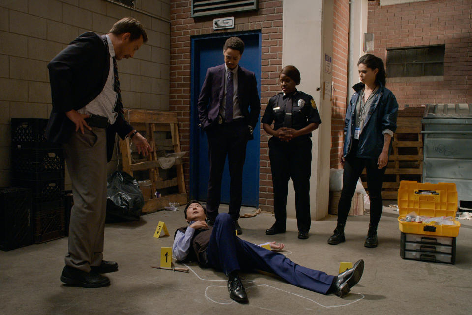 (L to R) Will Arnett as Terry Seattle, Ken Jeong, Philip Smithey as Detective Daz Phillips, Haneefah Wood as Chief RJ-Seattle, Lilan Bowden as Amber Kang of Murderville. (Courtesy Of Netflix)          