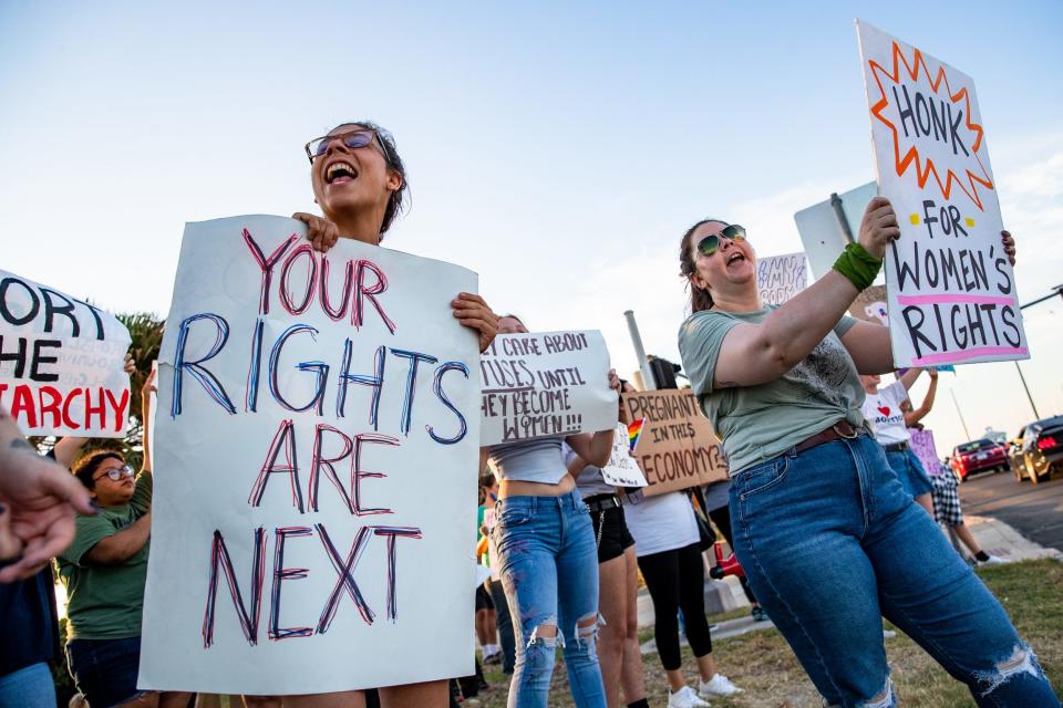 Abortion rights protesters demonstrate in downtown Corpus Christi at the intersection of Lawrence Street and N. Shoreline Blvd on Sunday, June 26, 2022.