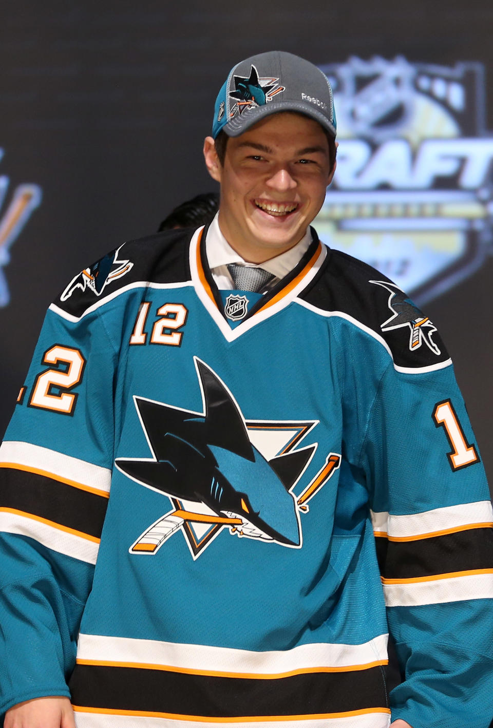 PITTSBURGH, PA - JUNE 22: Tomas Hertl, 17th overall pick by the San Jose Sharks, poses on stage during Round One of the 2012 NHL Entry Draft at Consol Energy Center on June 22, 2012 in Pittsburgh, Pennsylvania. (Photo by Bruce Bennett/Getty Images)