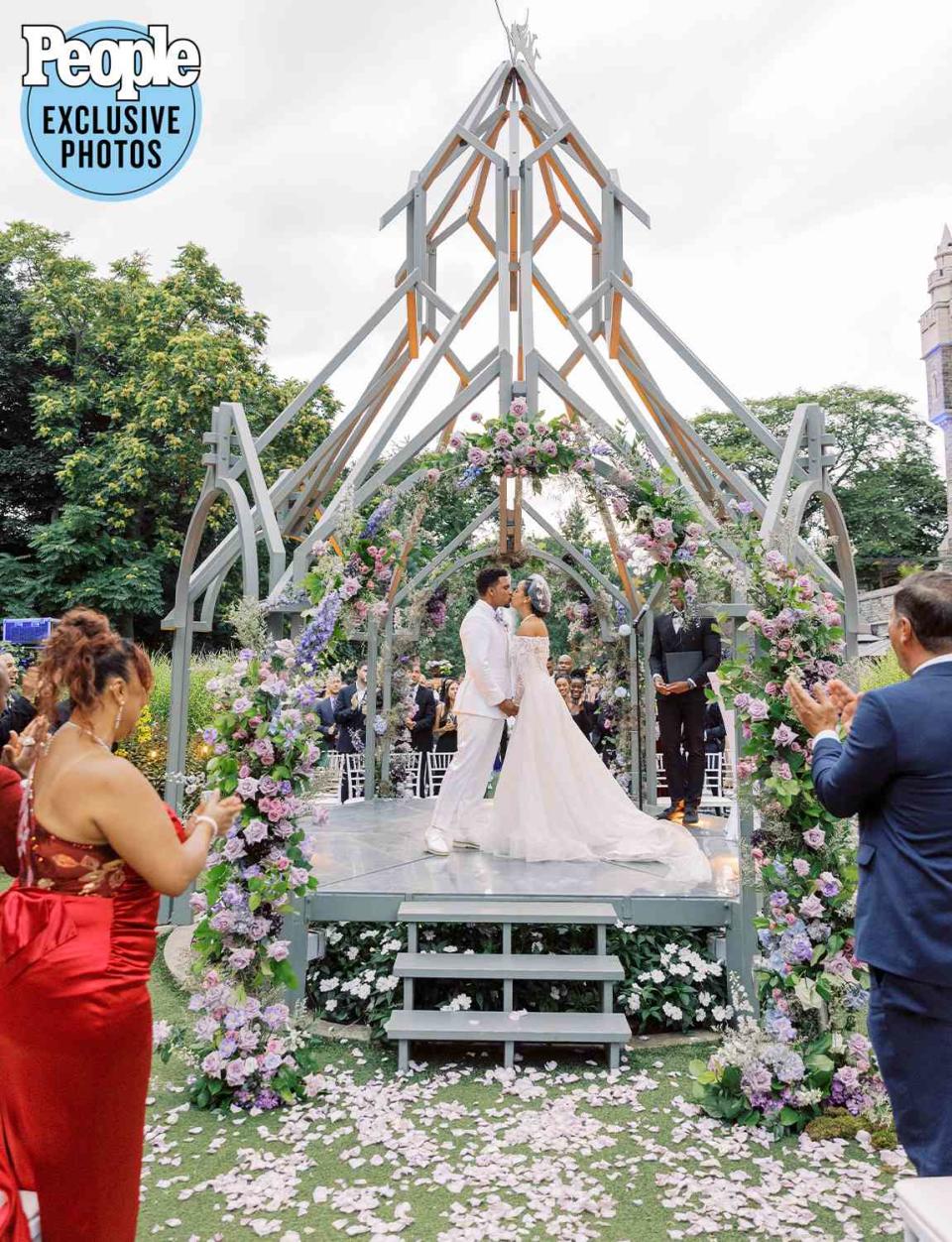 <p>Alicia Rinka Photography</p> Kiana Madeira and Lovell Adams-Gray during their wedding ceremony