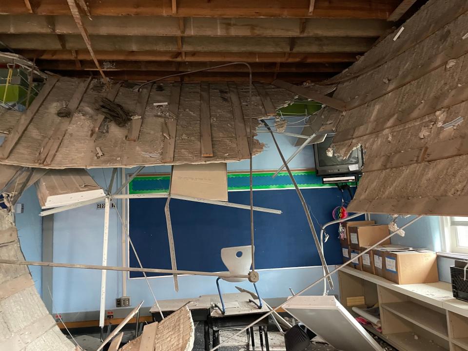 Debris from a partial collapse of the original plaster, concrete and metal ceiling litters a classroom at Roosevelt School in Keego Harbor. The school was closed after the incident in June 2022, in which no one was hurt.