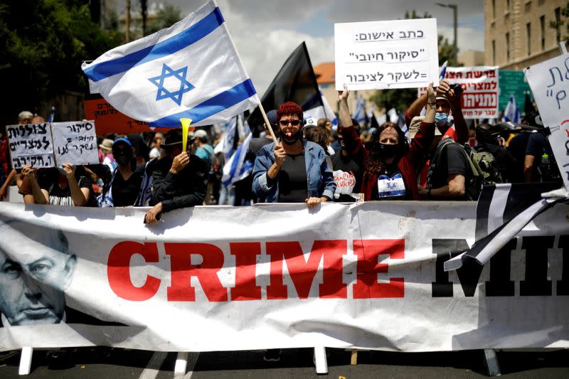 FILE PHOTO: Demonstration against Israeli Prime Minister Benjamin Netanyahu just before his corruption trial opens in Jerusalem