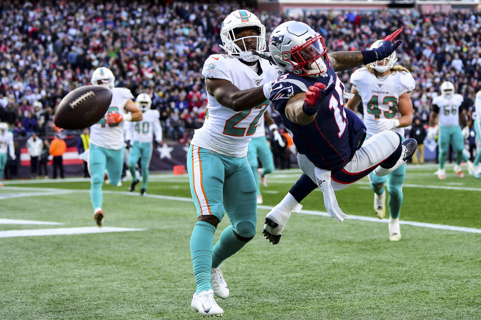 FOXBOROUGH, MA - DECEMBER 29: Tae Hayes #22 of the Miami Dolphins breaks up a pass intended for NKeal Harry #15 of the New England Patriots during the second quarter of a game at Gillette Stadium on December 29, 2019 in Foxborough, Massachusetts. (Photo by Billie Weiss/Getty Images)