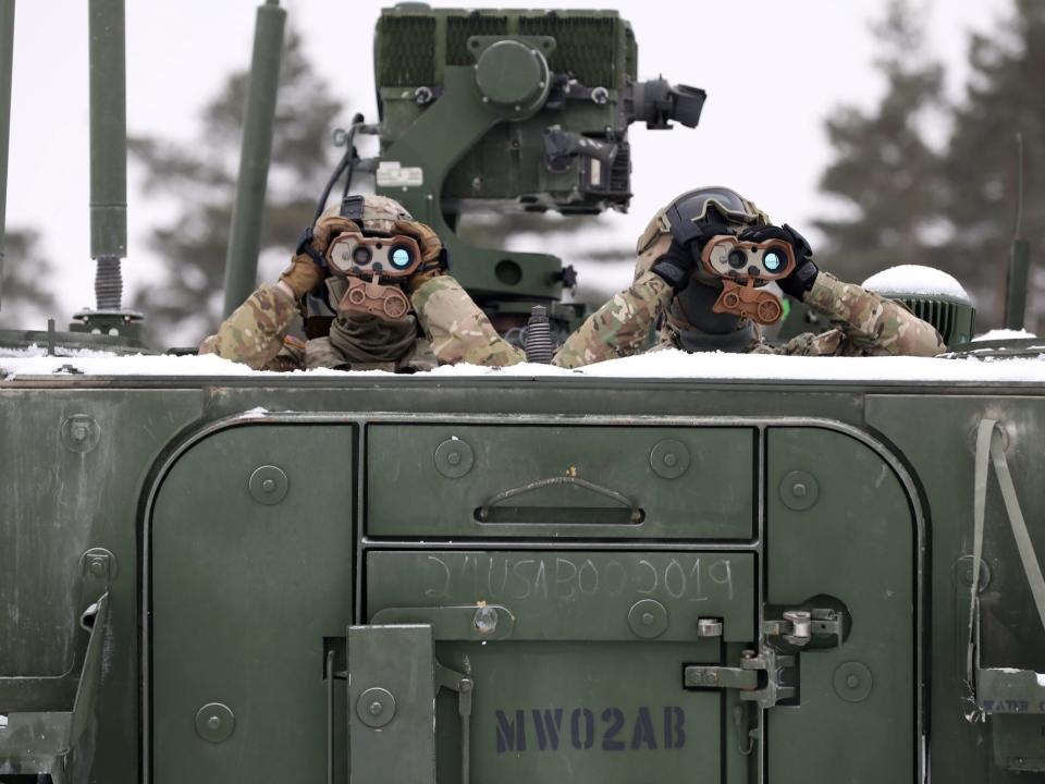 US soldiers with binoculars during NATO exercise