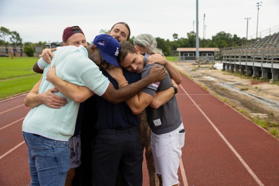 Bobby Berk, Karamo Brown, Jonathan Van Ness, Antoni Porowski and Tan France hug it out on an episode of “Queer Eye.” ILANA PANICH-LINSMAN/NETFLIX