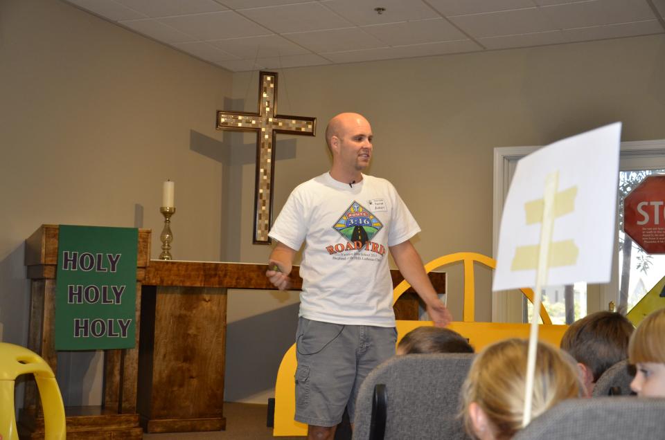 In this undated photo, Pastor Aaron Strong leads vacation bible school at Shepherd of the Hills Lutheran Church in Las Vegas, Nevada. Strong started the church in Las Vegas and served there until 2015.