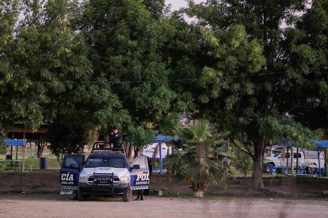 Authorities work at a crime scene where gunmen killed several people including a minor after storming a water park, in Cortazar, Guanajuato state, Mexico April 15, 2023.REUTERS/Sergio Maldonado