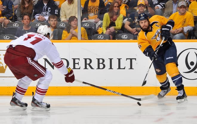 NASHVILLE, TN - MAY 04: Shea Weber #6 of the Nashville Predators passes the puck under the stick of Martin Hanzal #11 of the Phoenix Coyotes in Game Four of the Western Conference Semifinals during the 2012 NHL Stanley Cup Playoffs at the Bridgestone Arena on May 2, 2012 in Nashville, Tennessee. (Photo by Frederick Breedon/Getty Images)