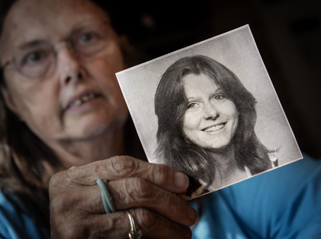 holds a photo of her sister Patricia Agnes Gildawie (Bill O'Leary / The Washington Post via Getty Images)