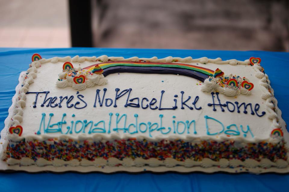 A cake bears the quote from "The Wizard of OZ," which was this year's theme for National Adoption Day in Lubbock.