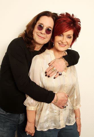 <p>Dave Hogan/Getty</p> Ozzy and Sharon Osbourne in London in June 2007
