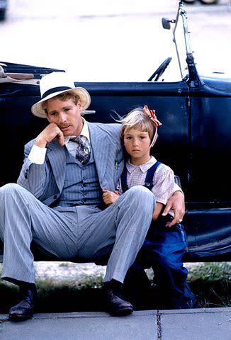 <p>Steve Schapiro/Corbis via Getty</p> Ryan O'Neal and Tatum during the making of 'Paper Moon'.