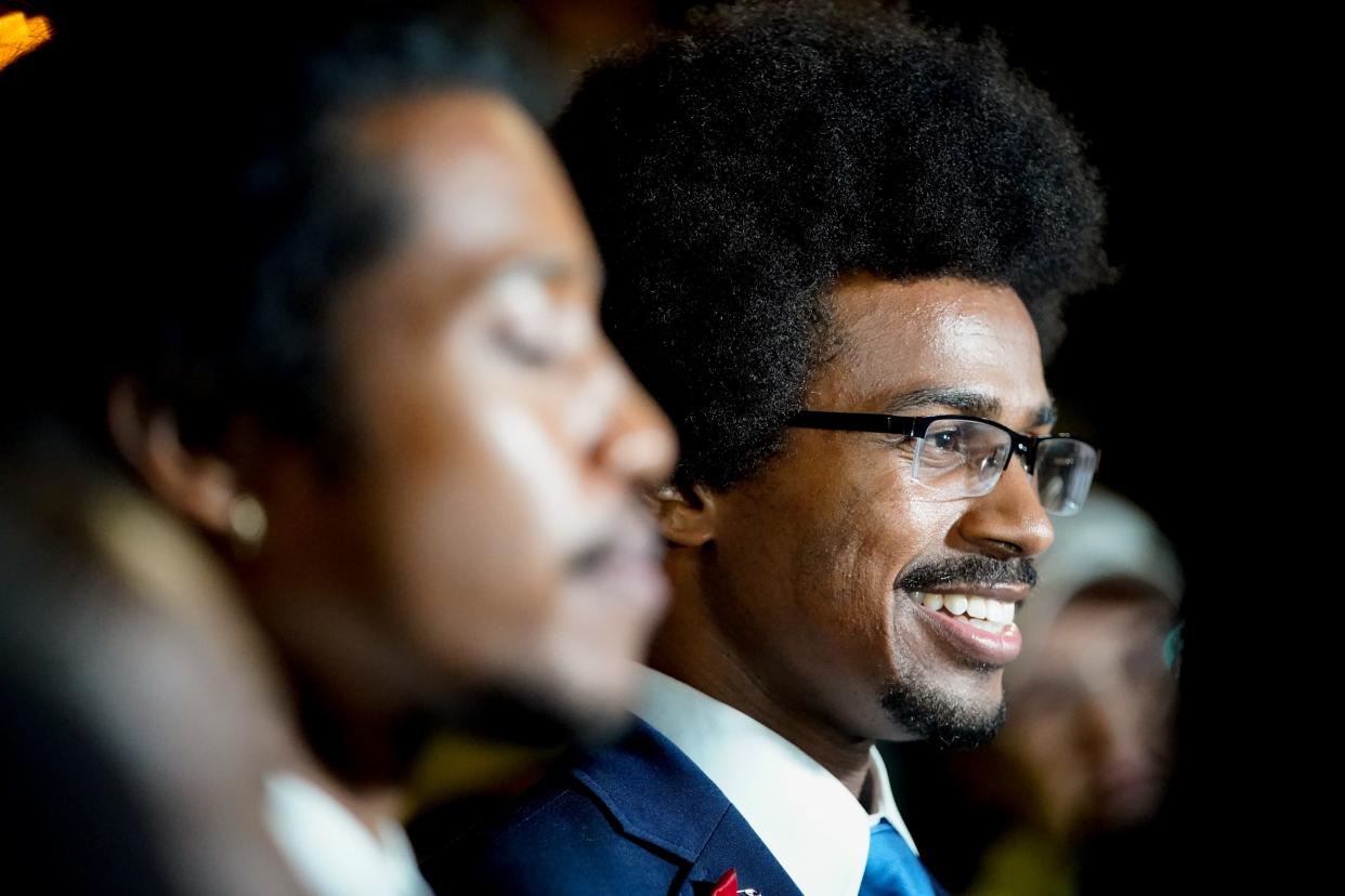 Justin Pearson, right, and Justin Jones meet with supporters at the State Capitol in Nashville, Tenn., following moves to expel them from the House of Representatives on Thursday, April 6, 2023. Jones and Pearson were expelled while Gloria Johnson retained her seat.