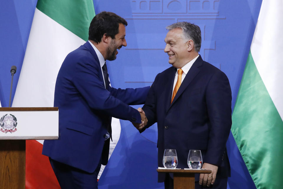 Italian Deputy Prime Minister and Minister of Interior Matteo Salvini, left, and Hungarian Prime Minister Viktor Orban shake hands during a joint press conference in the prime minister's office in Budapest, Hungary, Thursday, May 2, 2019. (Szilard Koszticsak/MTI via AP)