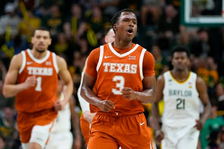 Texas’s Max Abmas reacts after scoring a basket against Baylor during the first half of an NCAA college basketball game, Monday, March 4, 2024, in Waco, Texas. (AP Photo/Julio Cortez)