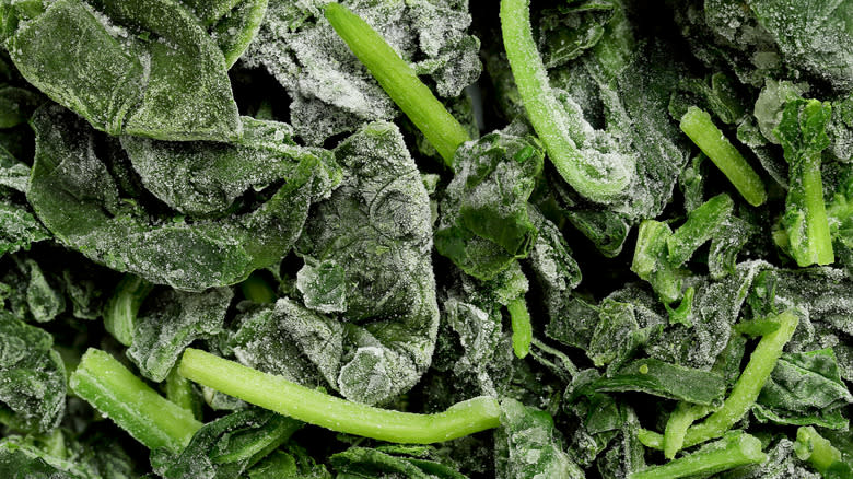 Closeup frozen spinach leaves