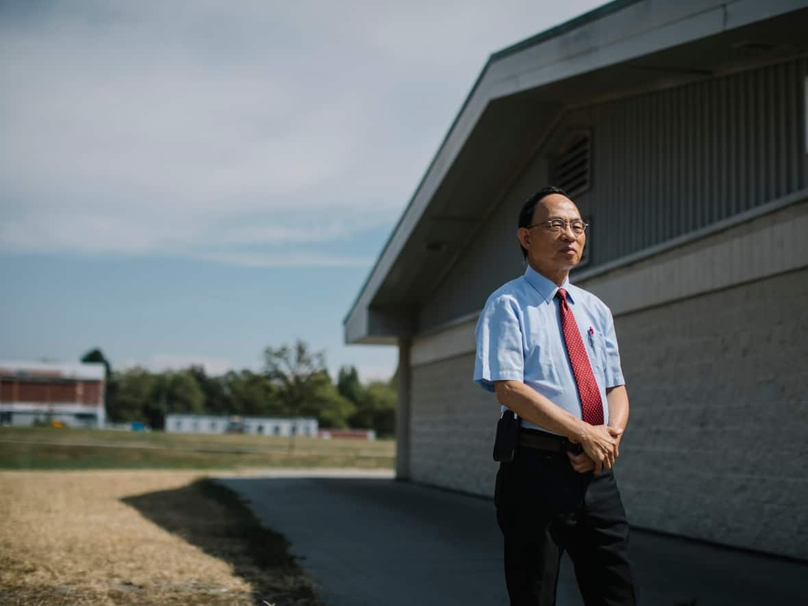 Victor Ho, the former editor of the Sing Tao Daily, Canada’s largest Chinese-Canadian newspaper, is pictured in Richmond, B.C., on Tuesday. He was charged with subversion of the state by the Hong Kong national security bureau on Aug. 3.  (Ben Nelms/CBC - image credit)