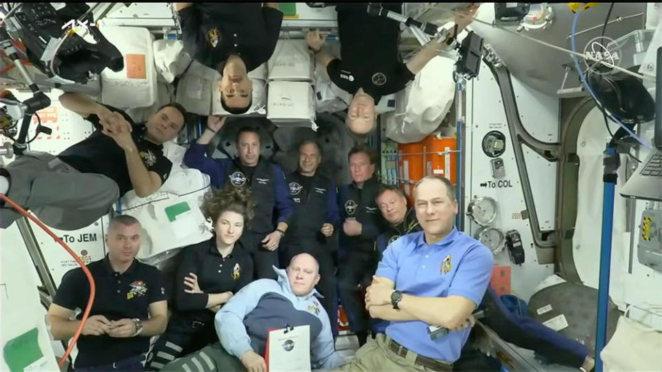 The space station's seven long-duration crew members welcomed the four Ax-1 commercial astronauts aboard the lab complex with a traditional post-docking ceremony. / Credit: NASA TV