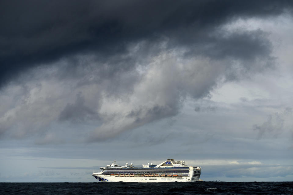 FILE - In this March 8, 2020, file photo, the Grand Princess maintains a holding pattern about 30 miles off the coast of San Francisco, carrying multiple people who have tested positive for the coronavirus. A year ago, the Grand Princess captured the world’s attention when it became clear the coronavirus pandemic had arrived on the shore of California, making the virus real to millions in the United States. Now, some of those who traveled on the ship on trips to Mexico and Hawaii are reliving the pain that followed after losing loved ones infected with the coronavirus aboard the ship. (AP Photo/Noah Berger, File)