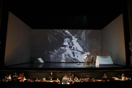 American tenor Tom Randle (Jack Twist) (R), and Canadian bass-baritone Daniel Okulitch (Ennis del Mar), pose with a backdrop of Madrid prior to a dress rehearsal of the opera "Brokeback Mountain" at the Teatro Real in Madrid, January 24, 2014. REUTERS/Paul Hanna