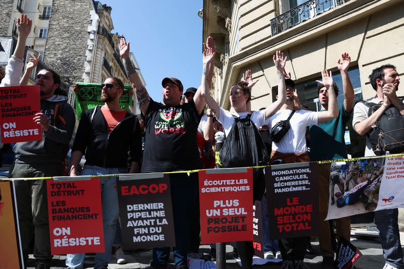 Environmental activists protest as TotalEnergies holds its annual shareholders meeting in Paris