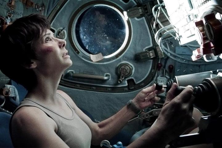 Sandra Bullock operates a spaceship in Gravity.