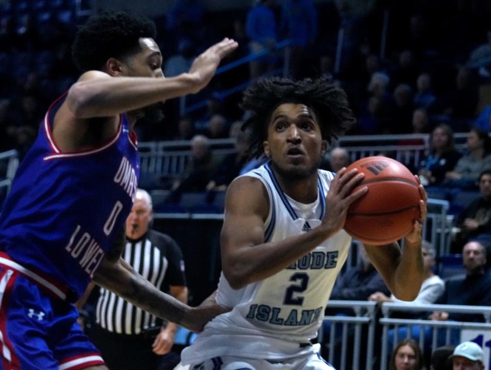 URI's Brayon Freeman looks for a shot around a UMass Lowell defender during a game in January. Freeman ranked second on the team in scoring at 14.3 points per game this season.