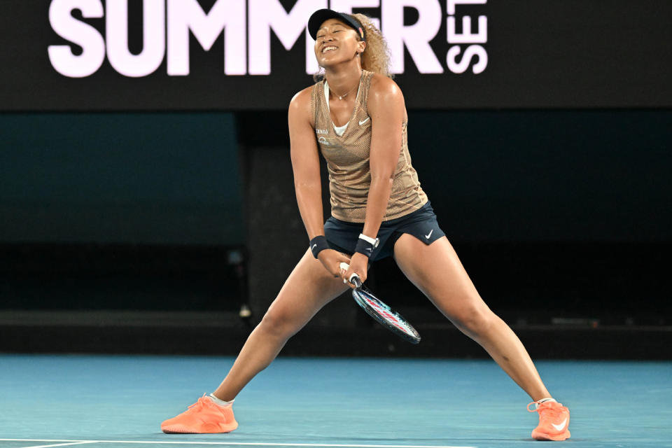 <p>Naomi Osaka of Japan gets to work against Andrea Petkovic of Germany during their quaterfinal match at the WTA Melbourne Summer Set tennis tournament in Australia on Jan. 7.</p>