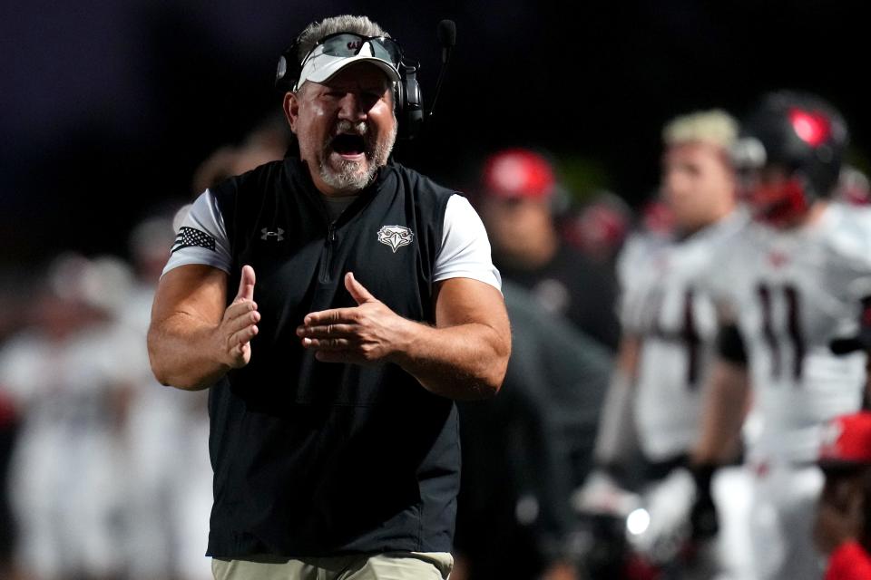 Lakota West Firebirds head coach Tom Bolden calls a timeout on the sideline in the first half of a high school football game between the Lakota West Firebirds and the Lakota East Thunderhawks, Friday, Oct. 6, 2023, at Lakota East High School in Liberty Township, Ohio.