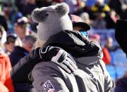 United States' Lindsey Vonn, left, hugs Michaela Shiffrin in the finish area of an alpine ski, women's World Cup super-G in Cortina D'Ampezzo, Italy, Sunday, Jan. 20, 2019. (AP Photo/Giovanni Auletta)