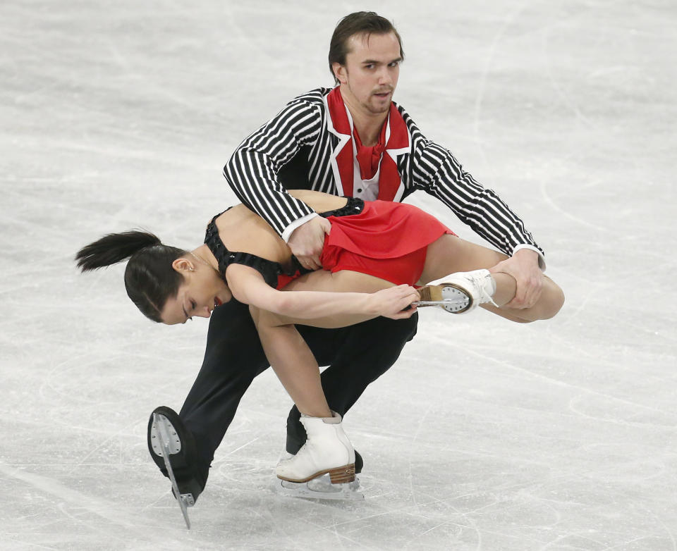 Russia's Ksenia Stoblova and Fedor Klimov compete in the pairs free skating at the European Figure Skating Championships in Budapest, Hungary, Sunday, Jan. 19, 2014. (AP Photo/Darko Bandic)